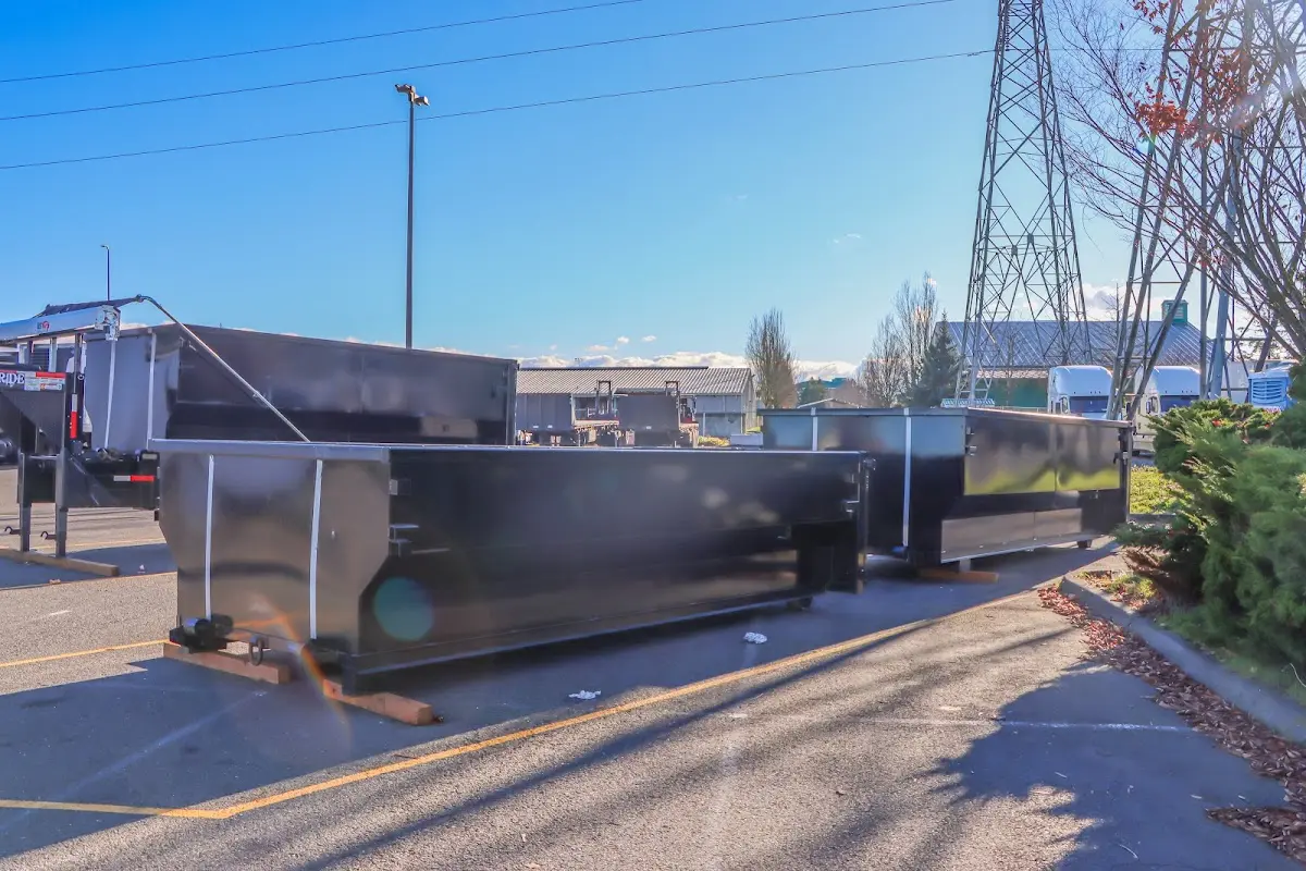 Roll-off dumpster ready for waste disposal at job site for 2 Yard Dumpster Rental in Gilberts